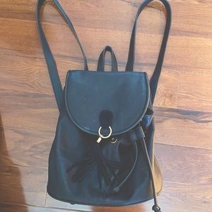 Worn once black leather backpack